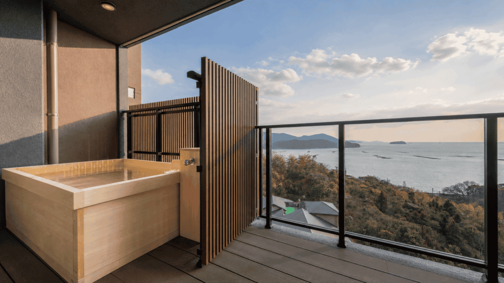 Private open-air bath with a Seto Inland Sea view at LiVEMAX Ocean