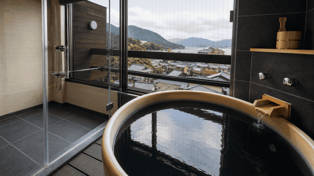 Private natural hot-spring bath with an island view at LiVEMAX Aki-Miyajima