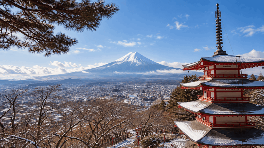 Snow-capped Mount Fuji and Chureito Pagoda overlooking Fujiyoshida on a clear winter day in December